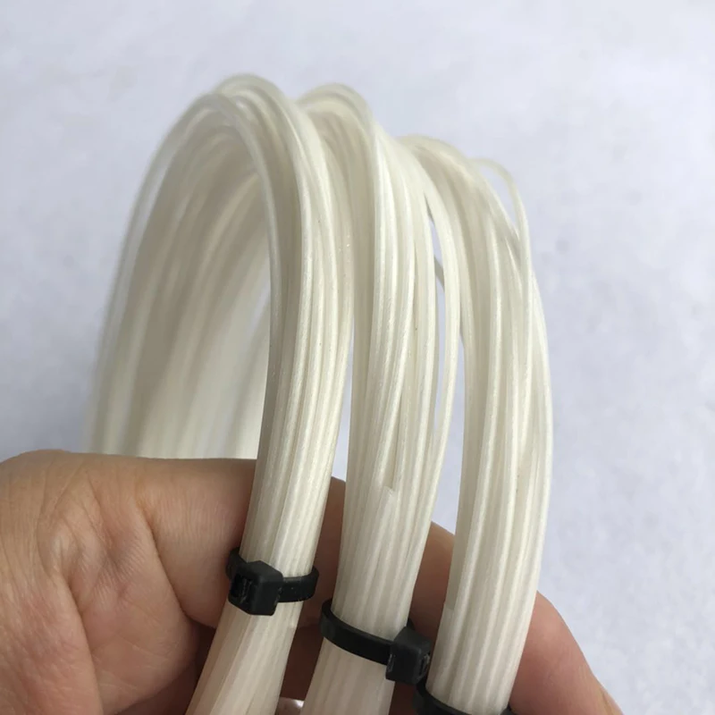 20pcs Baltā krāsa tenisa string mīksto sajūta 1.30 mm tenisa raketes stīgu elastīgs apmācību izturīgs tenisa raketes stīgas